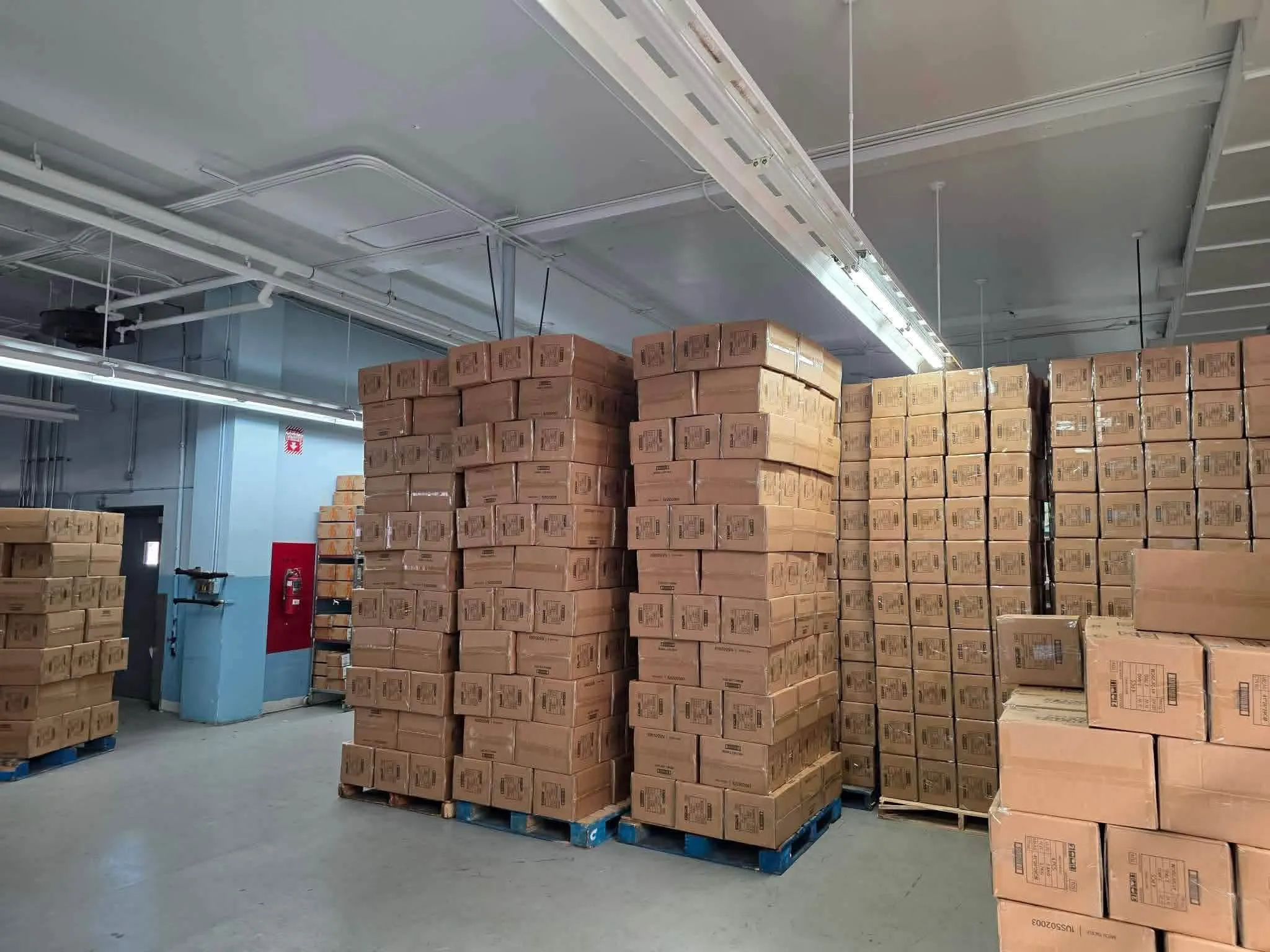 Boxes of Metal Cardbot toys at Agabyss's warehouse on March 13, 2026